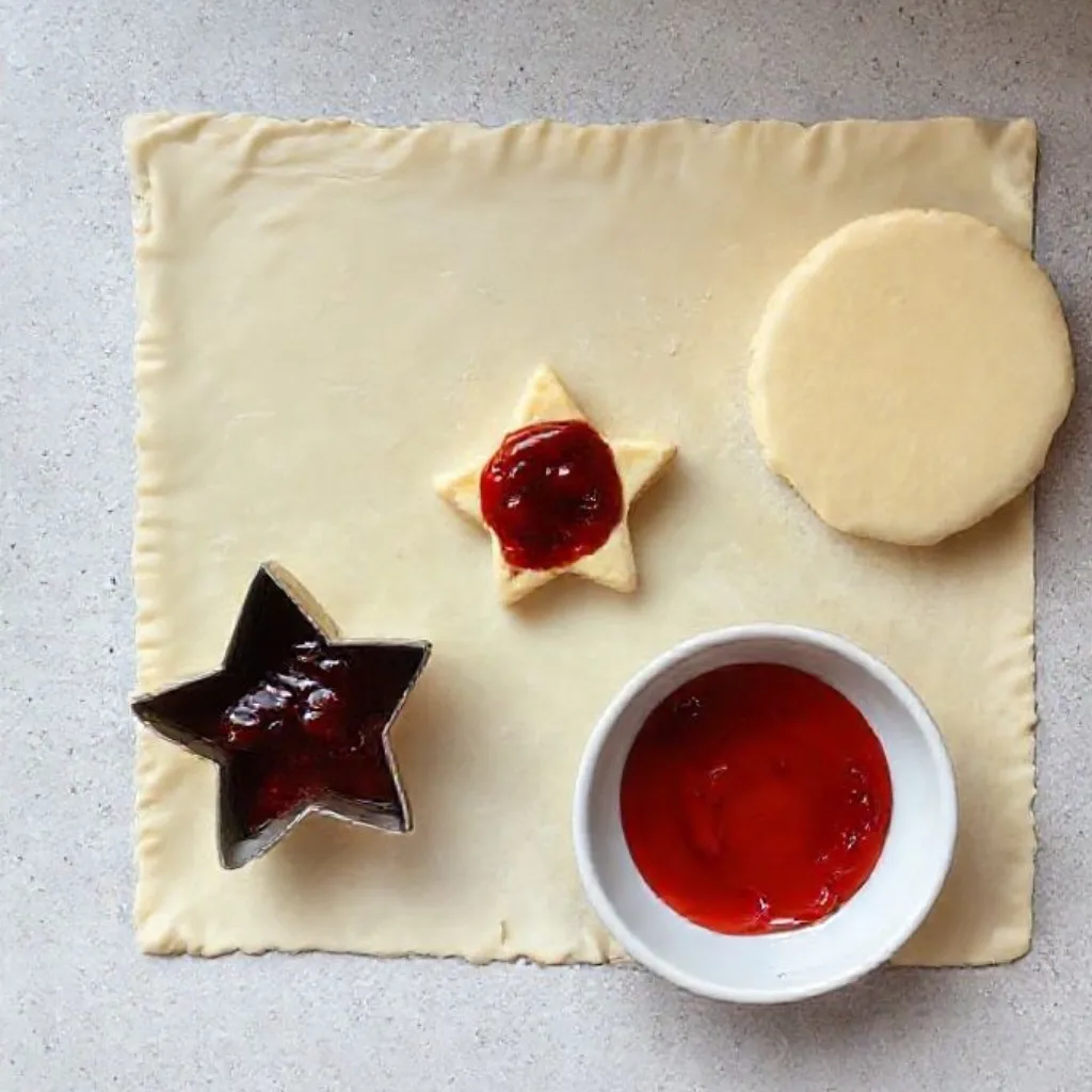 Irresistibly Cute Mini Brie Stars with Cranberry Jam That Steal Every Holiday Party 2 Ingredients for mini brie stars with cranberry jam appetizer