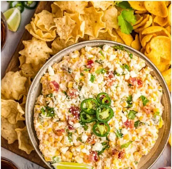 Delicious and creamy Crack Corn Dip served with tortilla chips