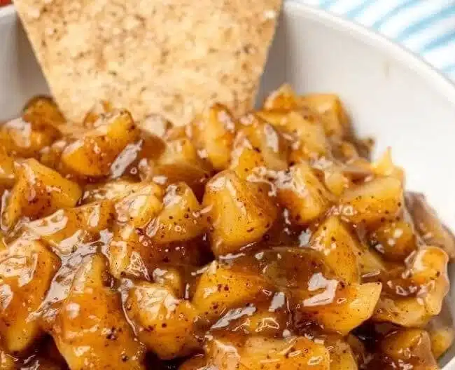 Creamy apple pie dip served with cinnamon sugar chips, a delicious dessert recipe.