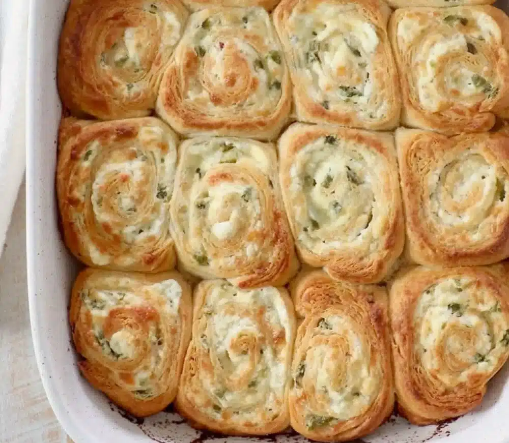 Spicy jalapeno popper crescent rolls on a serving platter