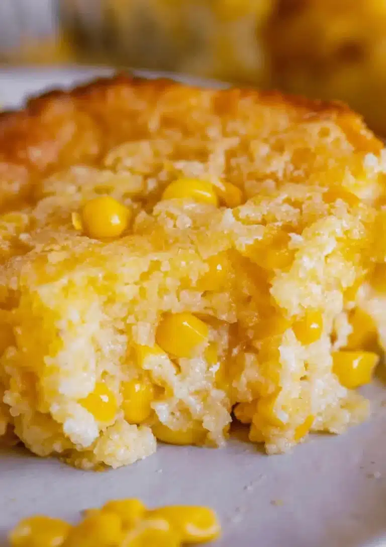 Delicious cornbread casserole served in a baking dish with toppings