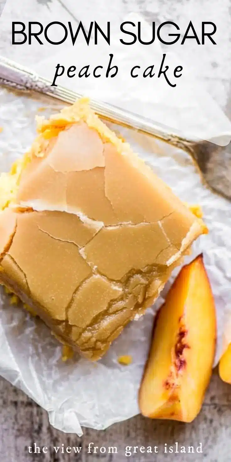 Slice of easy brown sugar peach cake topped with fresh peaches