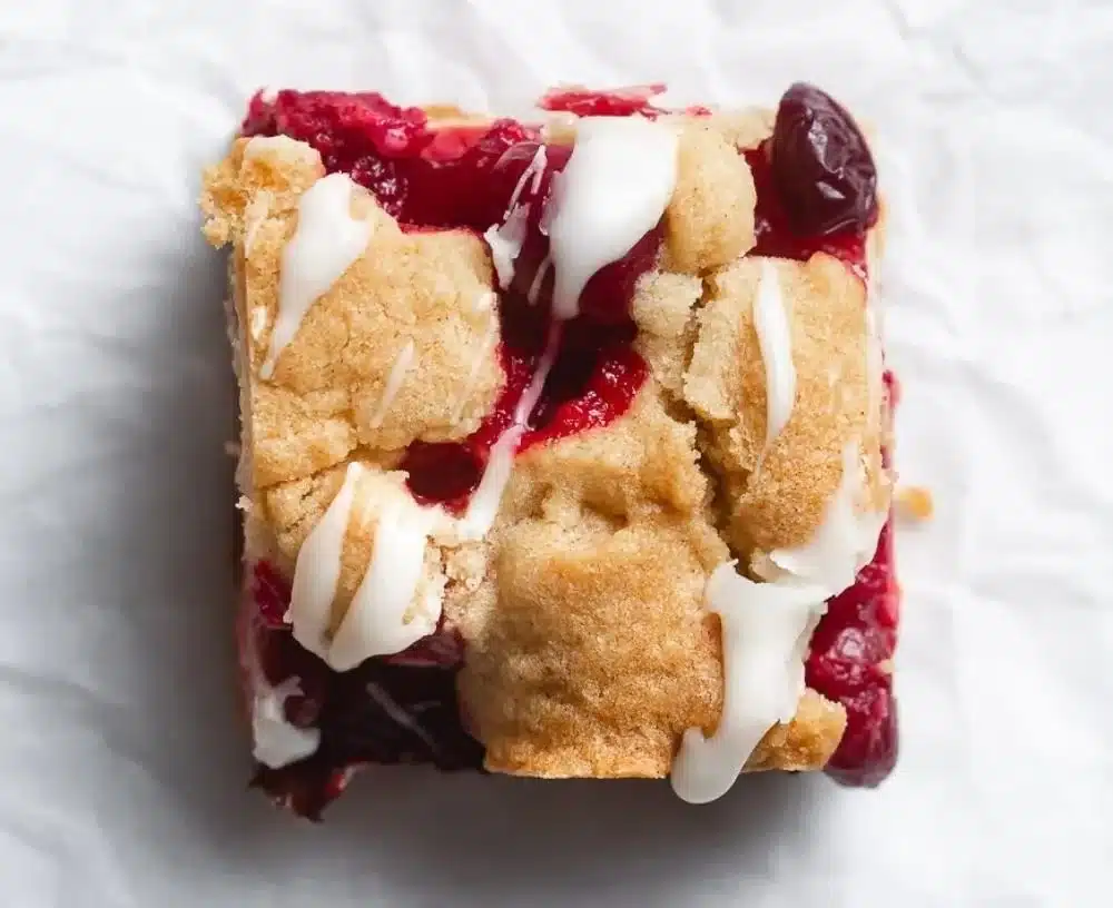 Delicious easy cranberry crumble bars with browned butter blondie topping