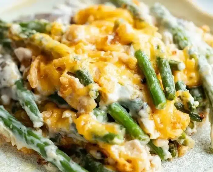 Easy Paula Deen's green bean casserole recipe with crispy onions on top