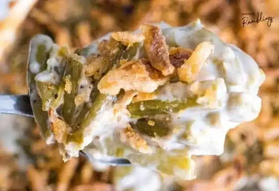 Homemade stovetop green bean casserole with artichokes and flavor-rich toppings