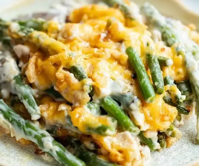 Delicious Paula Deen's green bean casserole recipe with creamy sauce and crispy toppings.