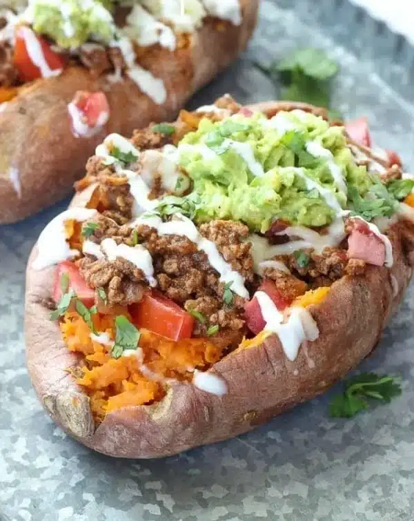 Delicious taco stuffed sweet potatoes recipe served in a bowl.